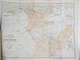 un livre ouvert contenant une carte du centre du pays