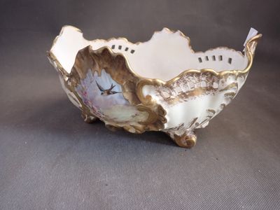 a white bowl with a picture of a woman on it