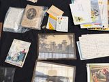 a table with many cards and pictures on it