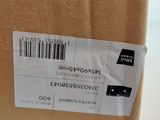 a brown box with a barcode on it sitting on a table