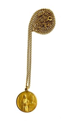 a close up of a gold coin with a chain on a white background