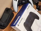 a box with a game controller and a cell phone on it