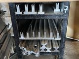 a metal rack with a bunch of metal bars on it