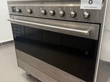 a silver oven that is on display in a store
