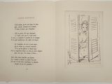 an open book with a drawing of a cat on it