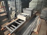 a large amount of steel beams in a warehouse