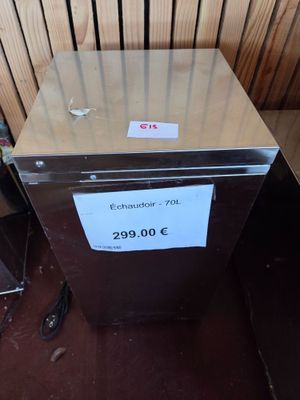 an image of a stainless steel refrigerator with a price tag on it