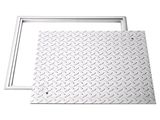 a close up of a metal sheet on a white background