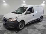 the white van is parked on a checkered tile floor