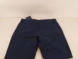 a pair of navy shorts with pockets on the front and side