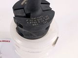 a picture of a black and white photo of a drill