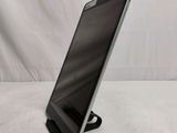 an image of a tablet computer sitting on top of a stand