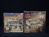 two board games that are sitting on a table