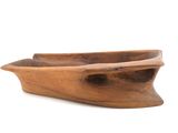 an image of a wooden boat shaped bowl sitting on top of a white surface