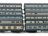 four train cars that are stacked on top of each other