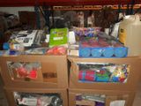a carton filled with lots of items in a garage