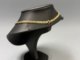 a close up of a black hat with a gold chain on it
