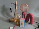 a lamp that is sitting on a table next to a box