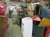 a room filled with lots of items in a warehouse