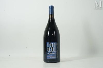 a bottle of wine that is sitting on a table