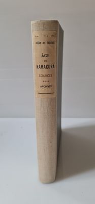 a book that is sitting on a white table