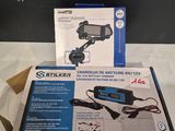une image représentant une boîte contenant un chargeur et un chargeur