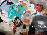 a pile of items that are sitting on a bed