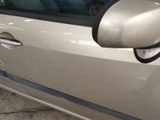 a car that has a side view mirror on the side of it