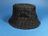 a close up of a black hat on a blue background