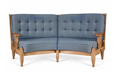an image of a pair of blue couches on a white background