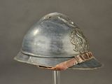 a helmet on a glass stand on a gray background
