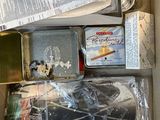 a box full of assorted items sitting on a table