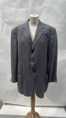 an image of a suit on a mannequin stand