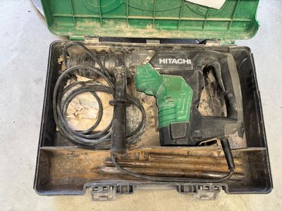 a tool in a case that is sitting on the floor