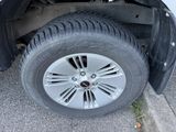 a close up view of a tire on a truck
