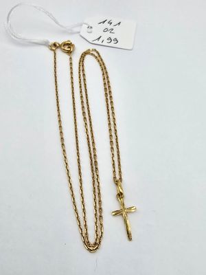 a gold chain with a cross and a tag on it