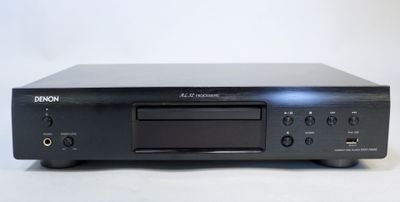 an image of a cd player sitting on top of a table