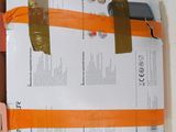 a cardboard box with a piece of tape on top of it