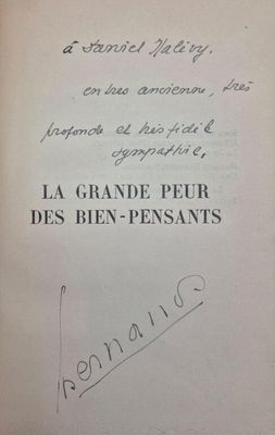 an old book with a handwritten title on it
