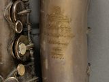 a close up of a saxophone that is sitting on a table