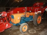 a tractor that is parked inside of a building