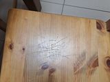 a wooden chair that has been stained with a stain
