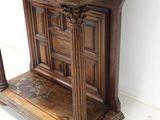 a wooden table with a clock on top of it