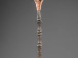 an image of a diamond shaped object on a stick