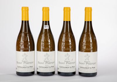 three bottles of wine sitting next to each other on a table