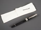 an image of a pen and a pouch on a table