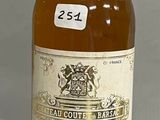 a bottle of whiskey sitting on a table