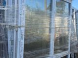 a large window that has been wrapped up on a pallet