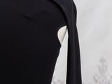 the back of a black dress on a mannequin mannequin mannequin mannequin mannequin mannequin mannequin mannequin