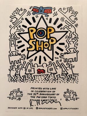 a white poster with a drawing of a star in the middle of it